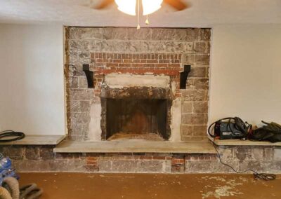 Masonry Firebox before repair - tools to the right and foreground.